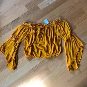 Charlotte Russe gold peasant top. Size M.